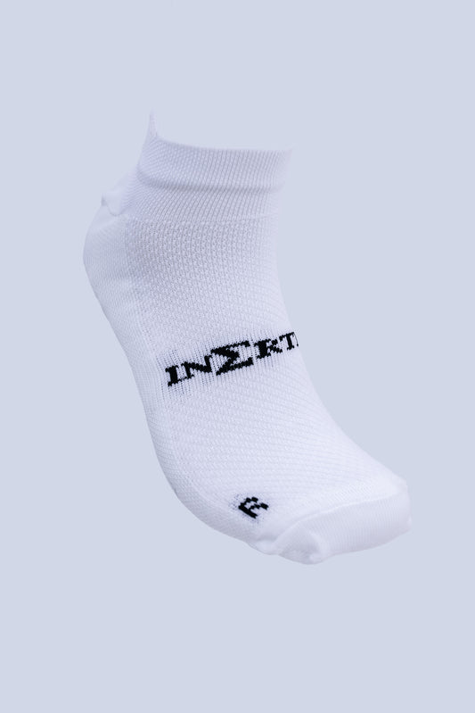 Inertia trainer grip socks in white, front view